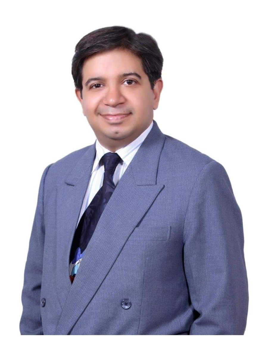 Advocate Kapil Chawla, in a dark suit, looking toward the viewer